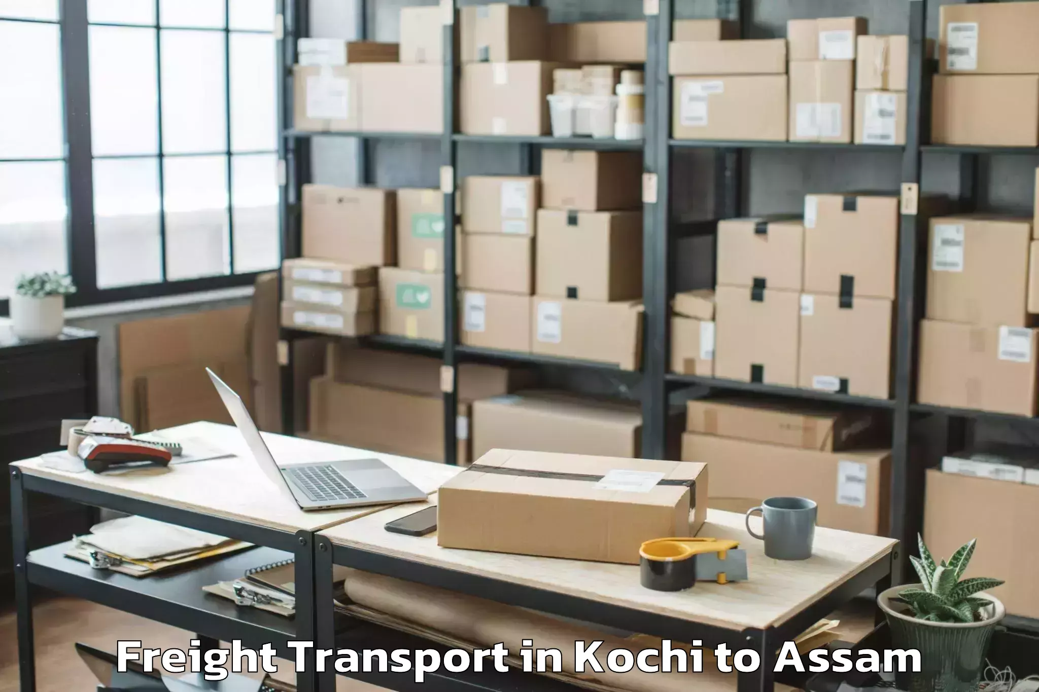 Book Kochi to Dhakuakhana Freight Transport